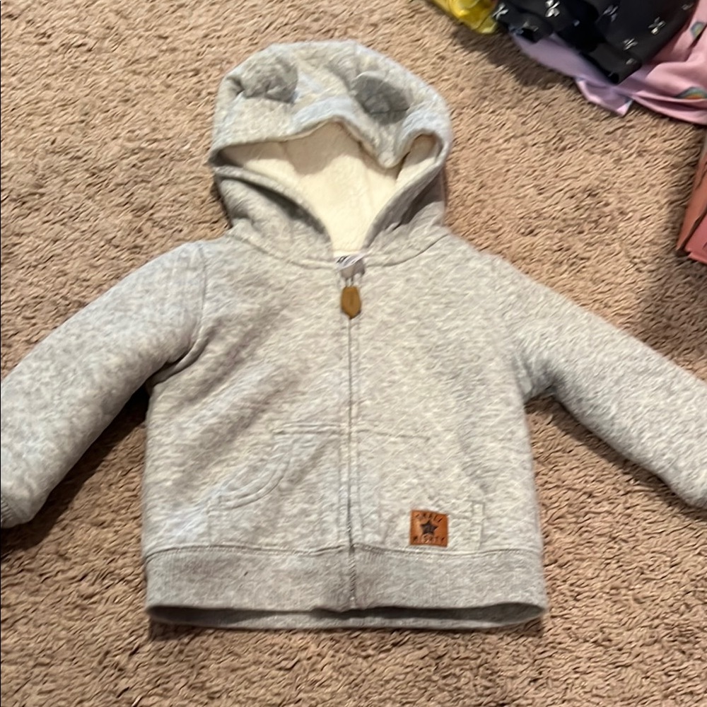 Gray Zip-Up Hoodie with Ribbed Cuffs and Leather Patch